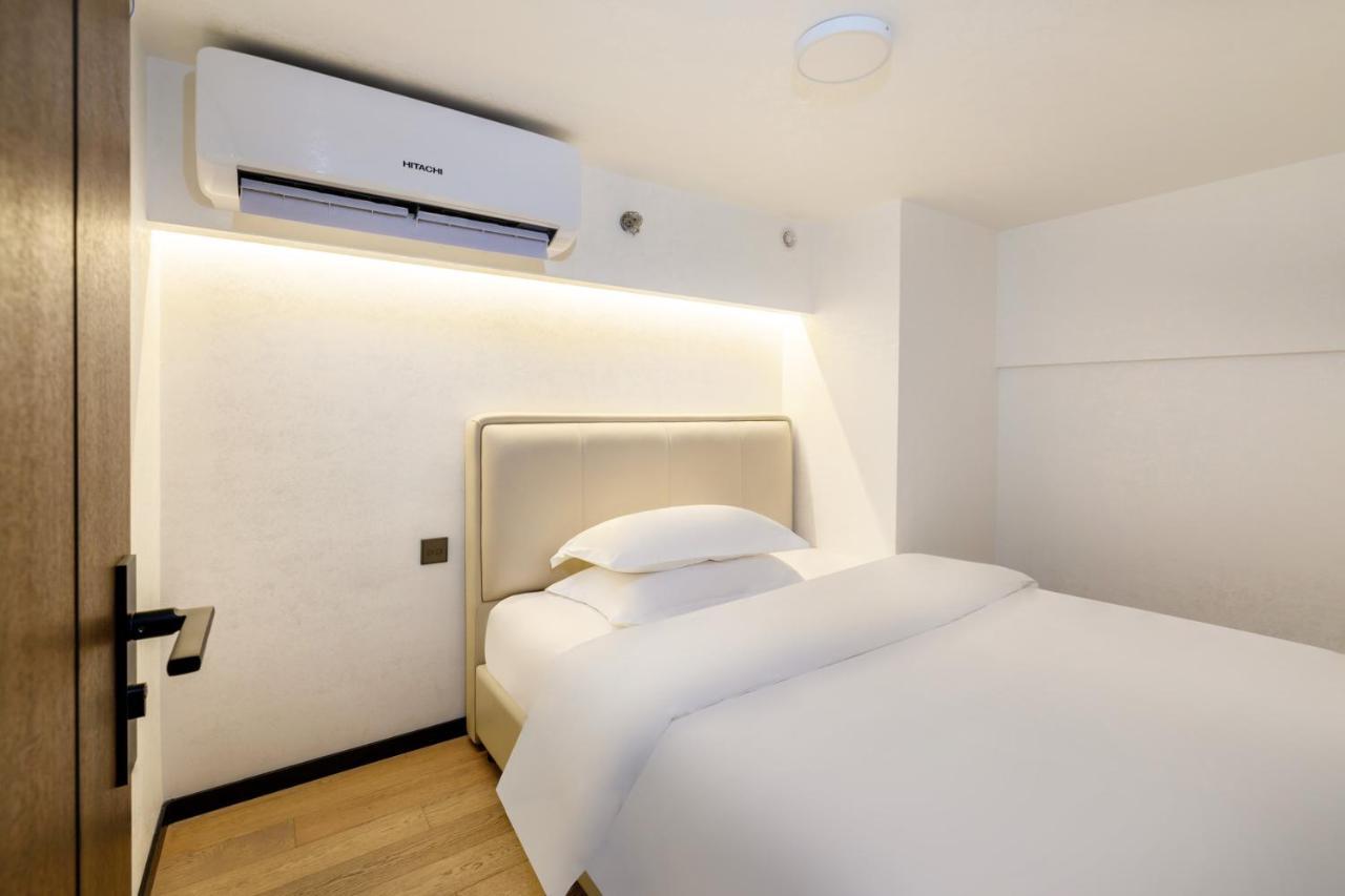 Xinghe Times Apartment - Shenzhen North Railway Station Екстер'єр фото